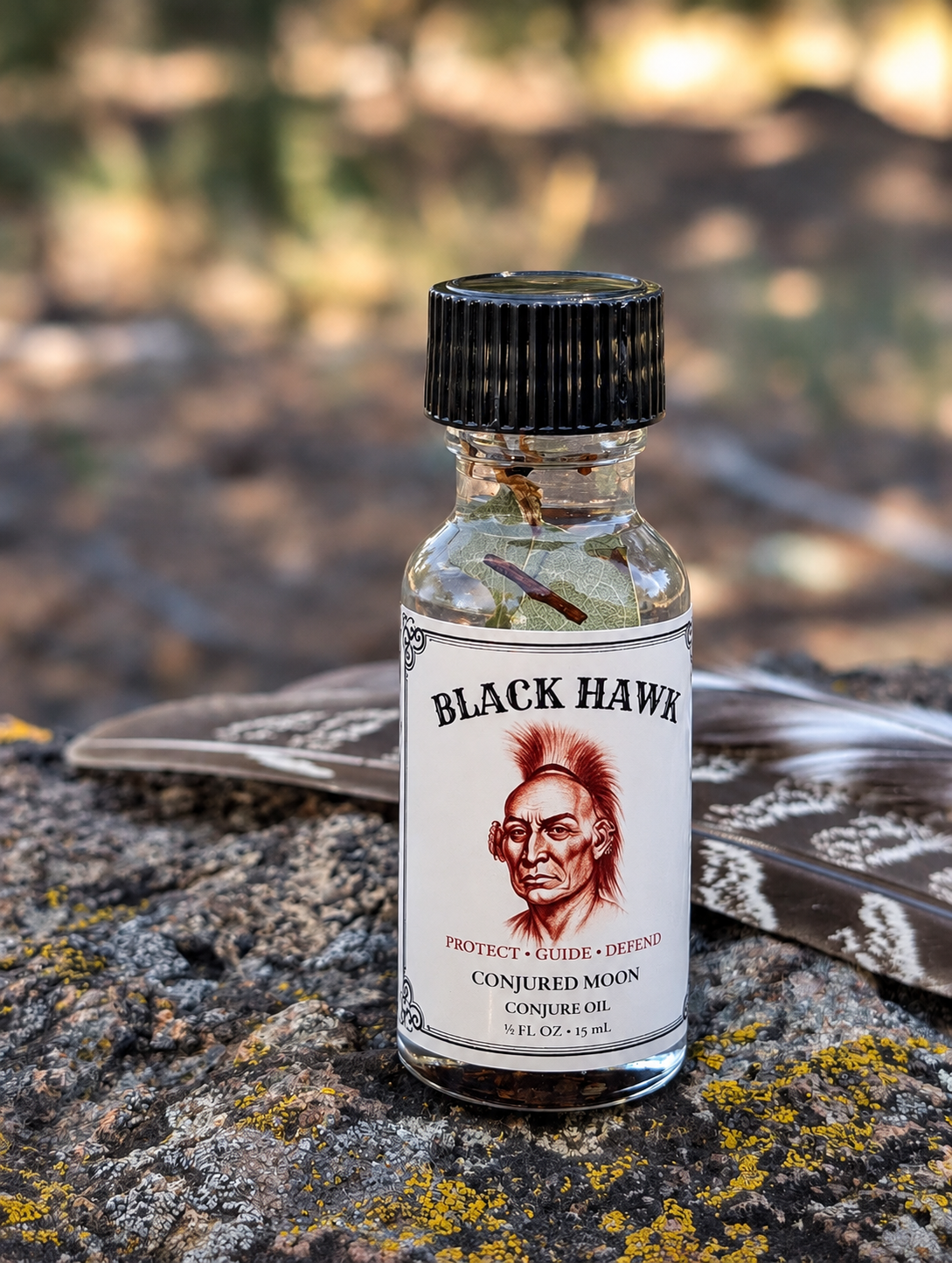 Black Hawk protection oil handcrafted by Conjured Moon for ritual and candle work