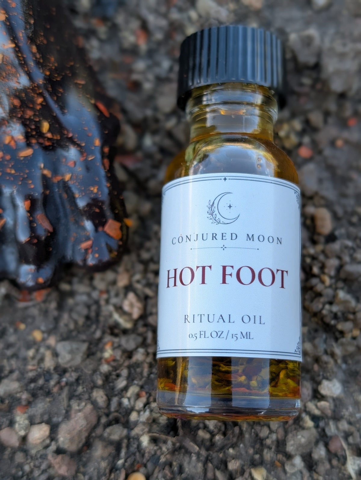 Hot Foot Ritual Oil with dressed foot candle for removal work